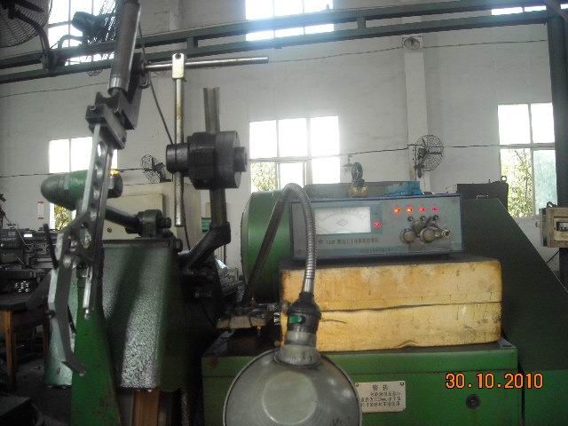 MQ8240曲軸磨床安裝主動測量儀現(xiàn)場實例